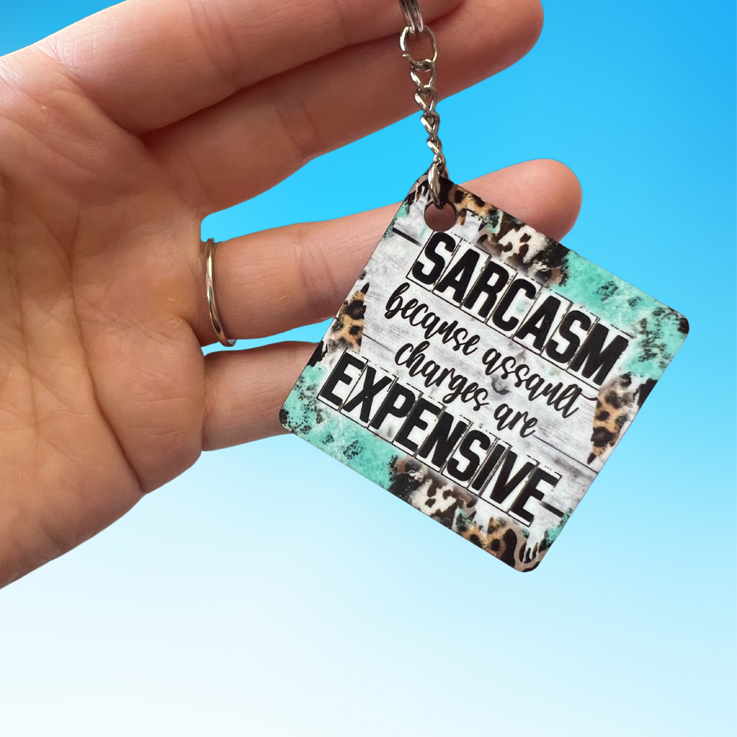 "Sarcasm Because Assault Charges are Expensive" Keychain