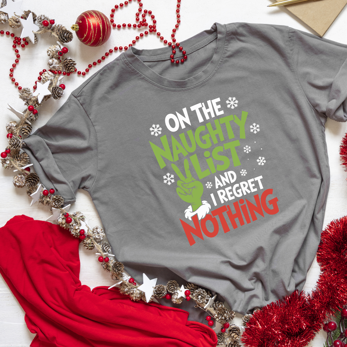 "On the Naughty list and I regret Nothing" T-Shirt