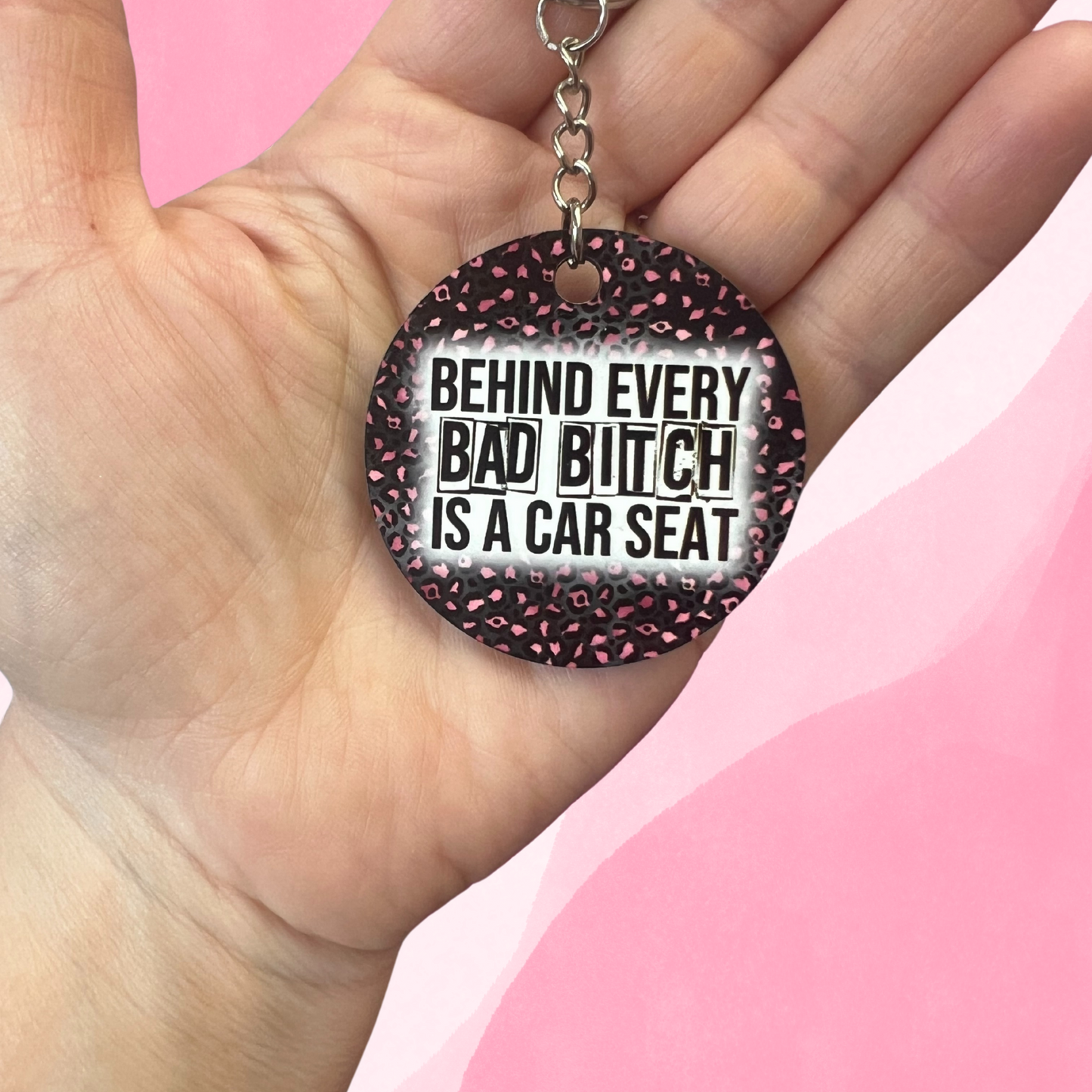 "Behind Every Bad Bitch Is A Car Seat" Keychain