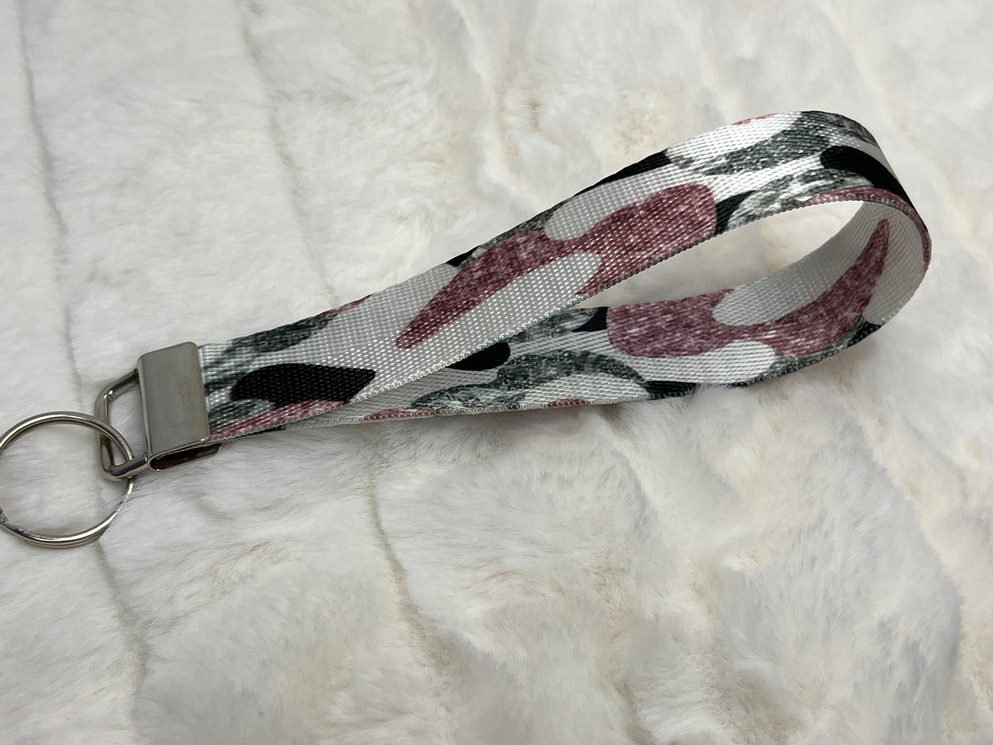"Glitter black, white and pink camo patterned" Wristlet