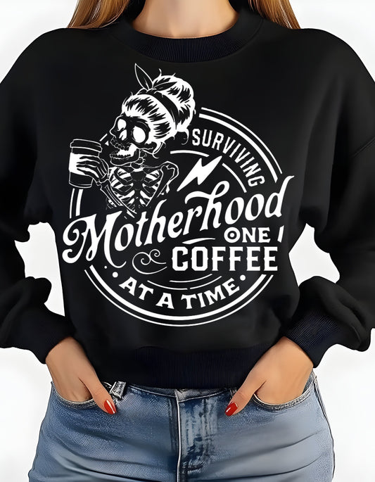 “surviving motherhood one coffee at a time” hoodie