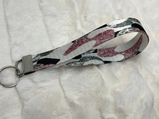 "Glitter black, white and pink camo patterned" Wristlet